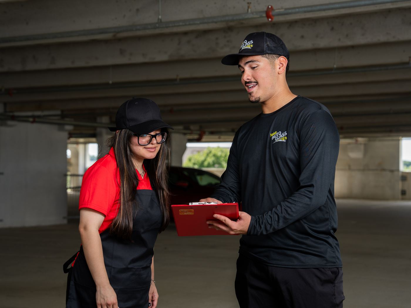 KAG technician going over the details with a customer